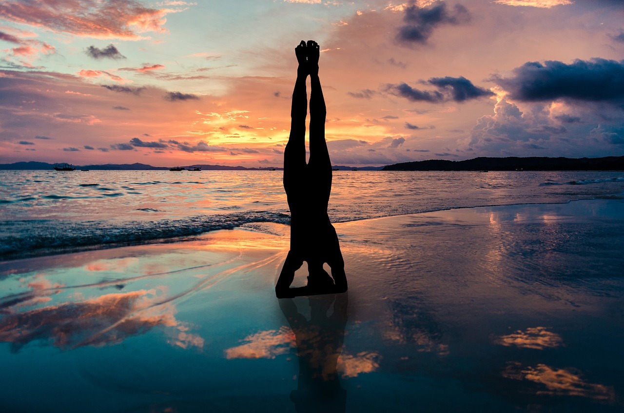 yoga stand in hands silhouette 2149407 1280 2